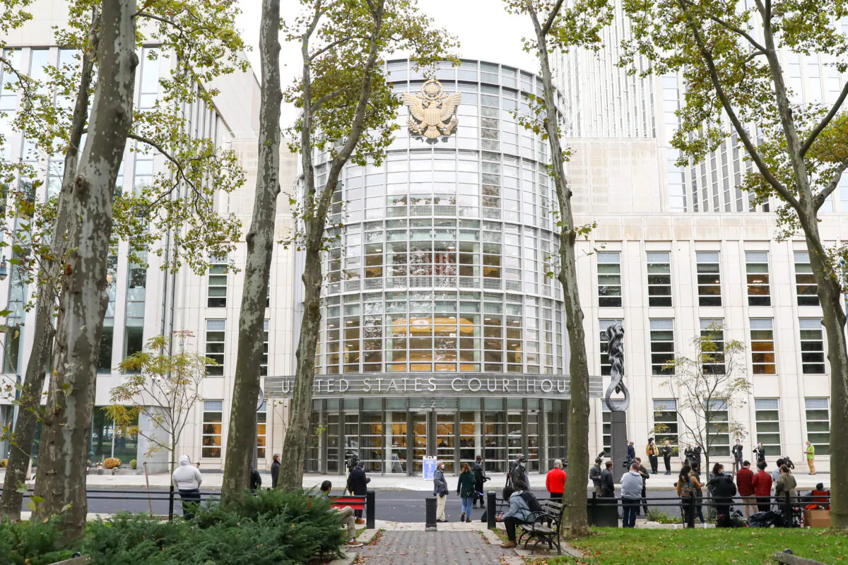 Reporters and photographers are waiting outside of US District Court for the Eastern District of New York on Oct. 27, 2020. (Chung I Ho/The Epoch Times)