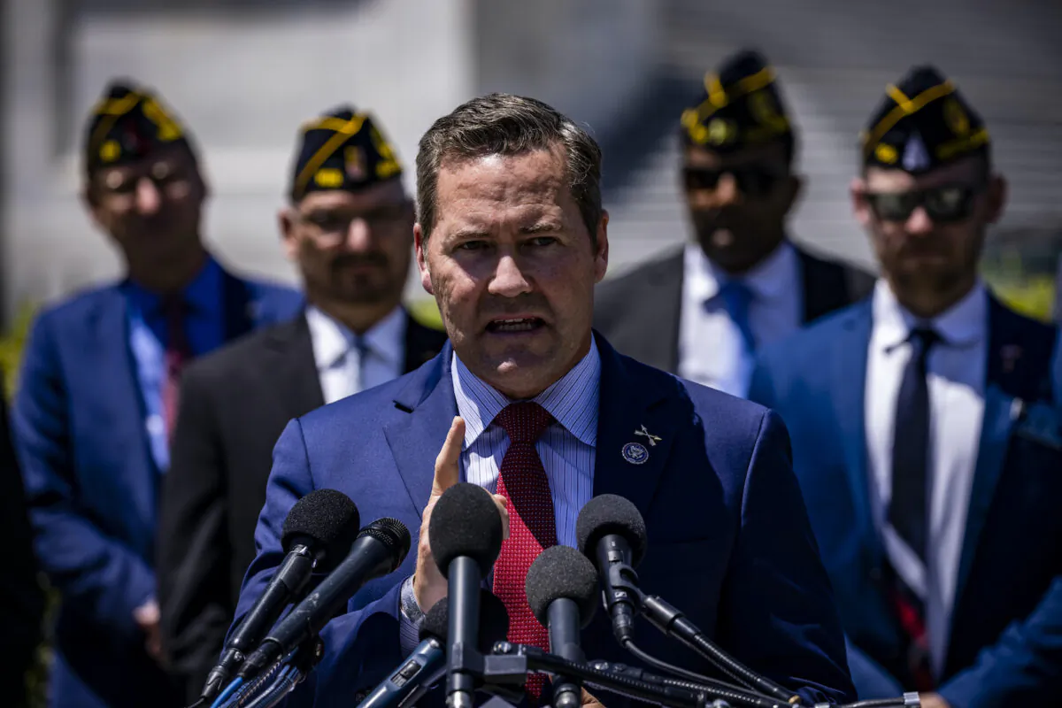 Rep. Mike Waltz (R-Fla.) speaks with members of the American Legion during a news conference on Capitol Hill in Washington on June 16, 2021. (Samuel Corum/Getty Images)