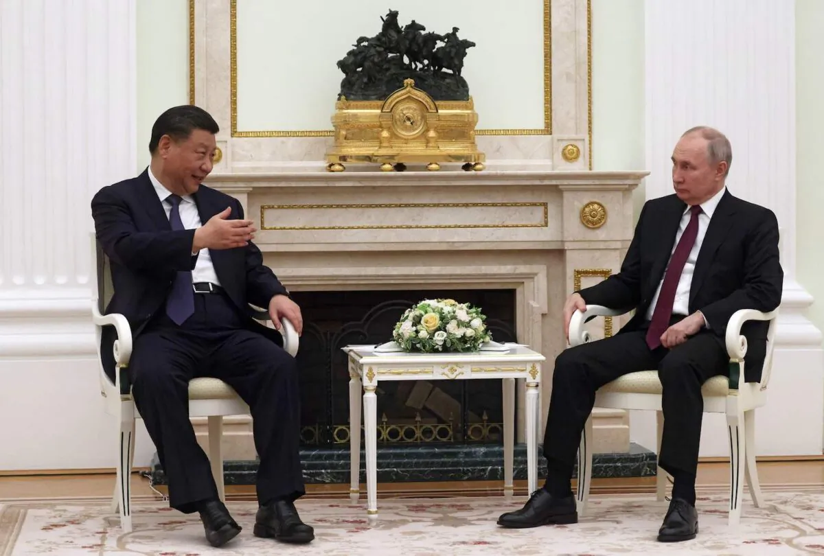 Russian President Vladimir Putin meets with China's President Xi Jinping at the Kremlin in Moscow on March 20, 2023. (Sergei Karpukhin/SPUTNIK/AFP via Getty Images)