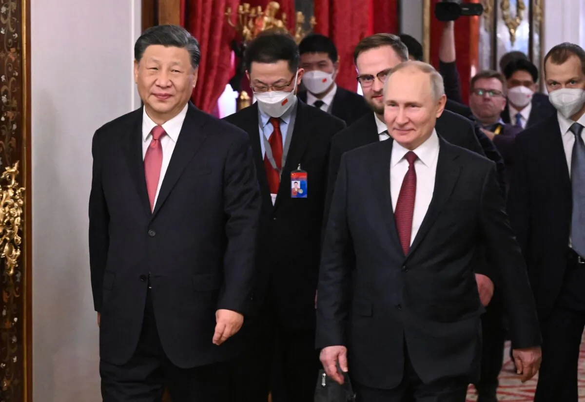 Russian President Vladimir Putin (R) meets with Chinese leader Xi Jinping at the Kremlin in Moscow on March 21, 2023. (Photo by Grigory SYSOYEV / SPUTNIK / AFP via Getty Images)
