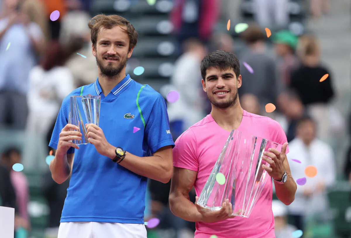 Winner Carlos Alcaraz of Spain with runner-up Daniil Medvedev after the final during the BNP Paribas Open in Indian Wells, Calif., on March 19, 2023. (Julian Finney/Getty Images)