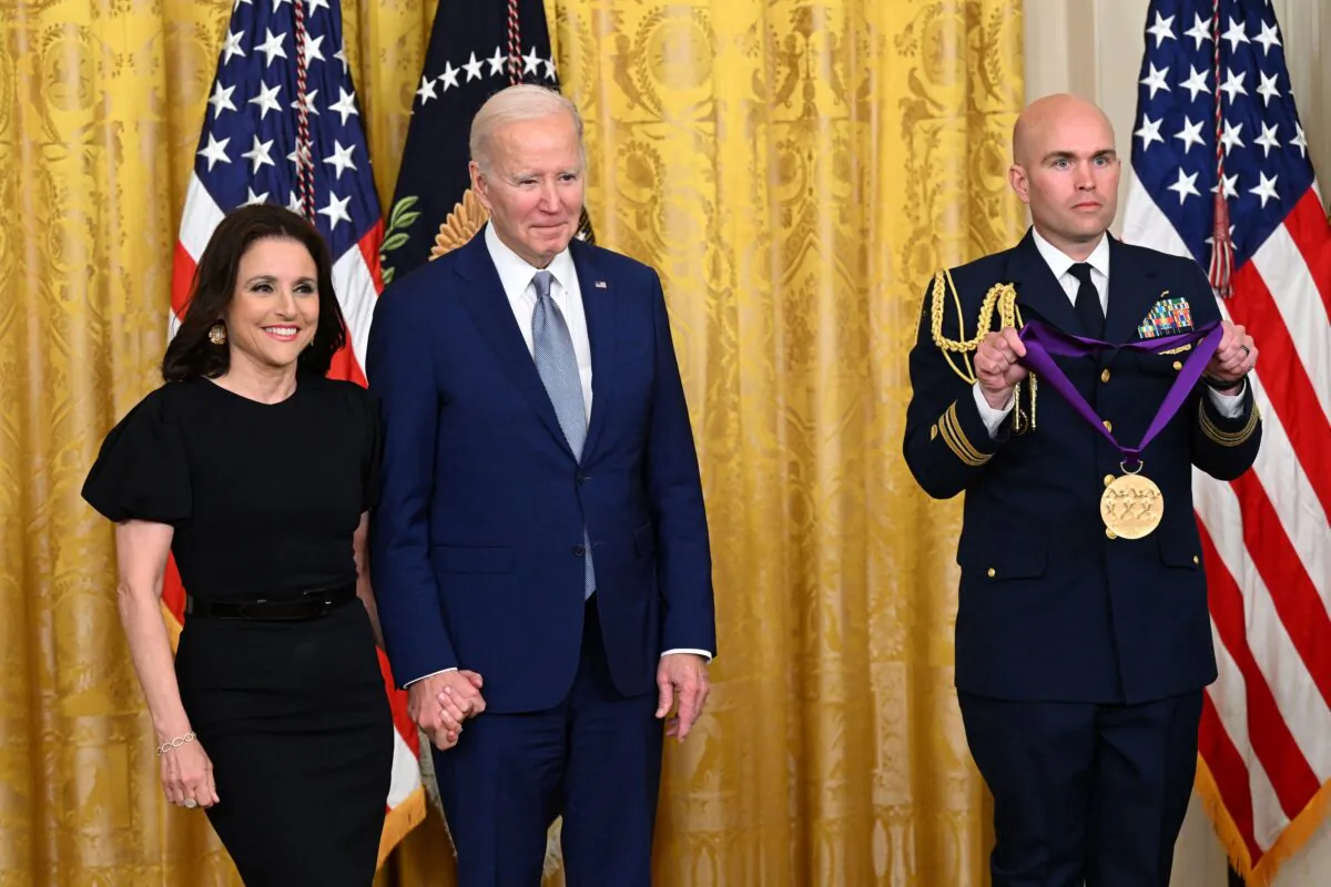 President Joe Biden awards actress Julia Louis-Dreyfus with the 2021 National Medal of Arts during a ceremony in the East Room of the White House on March 21, 2023. (Saul Loeb/AFP via Getty Images)
