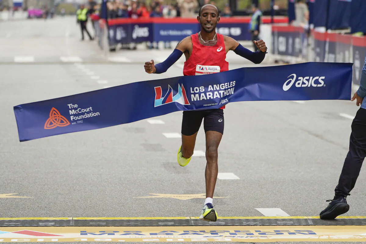 Jemal Yimer, of Ethiopia, wins the men's division of the Los Angeles Marathon in Los Angeles on March 19, 2023. (Damian Dovarganes/AP Photo)