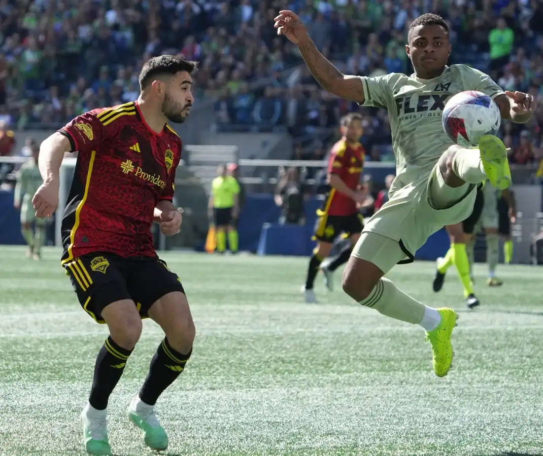 Seattle Sounders midfielder Alex Roldan (16) and Los Angeles FC defender Diego Palacios (12) battle for control of the ball during the first half at Lumen Field in Seattle on Mar. 18, 2023. (Kirby Lee/USA TODAY Sports via Field Level Media)
