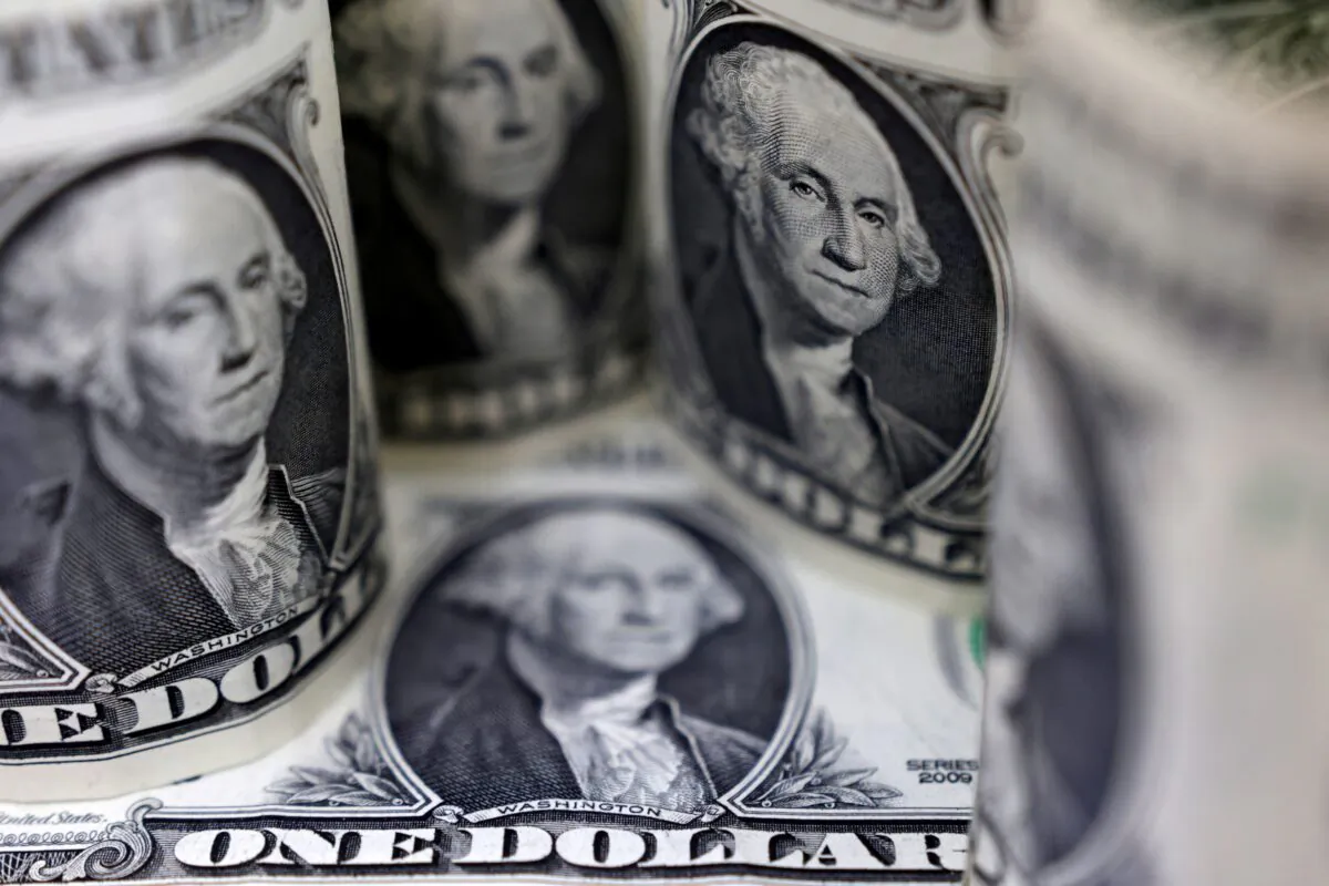 U.S. Dollar banknotes on July 17, 2022. (Dado Ruvic/Reuters)