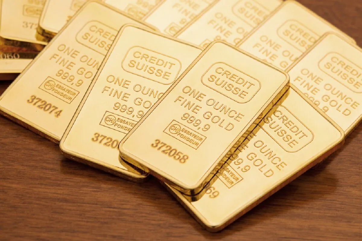 Newton, New Jersey January 25, 2015 - One ounce gold bars on dark wood surface
Ken Weinrich/Shutterstock