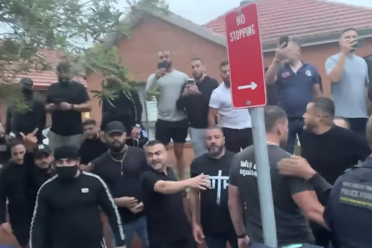 A supplied screengrab taken from video footage obtained on Wednesday, March 22, 2023, of a violent street protest outside St Michael's Church in Belfield, Sydney, Australia where One Nation leader Mark Latham was scheduled to give a speech on March 22, 2023. (AAP Image/Supplied by Community Action For Rainbow Rights)