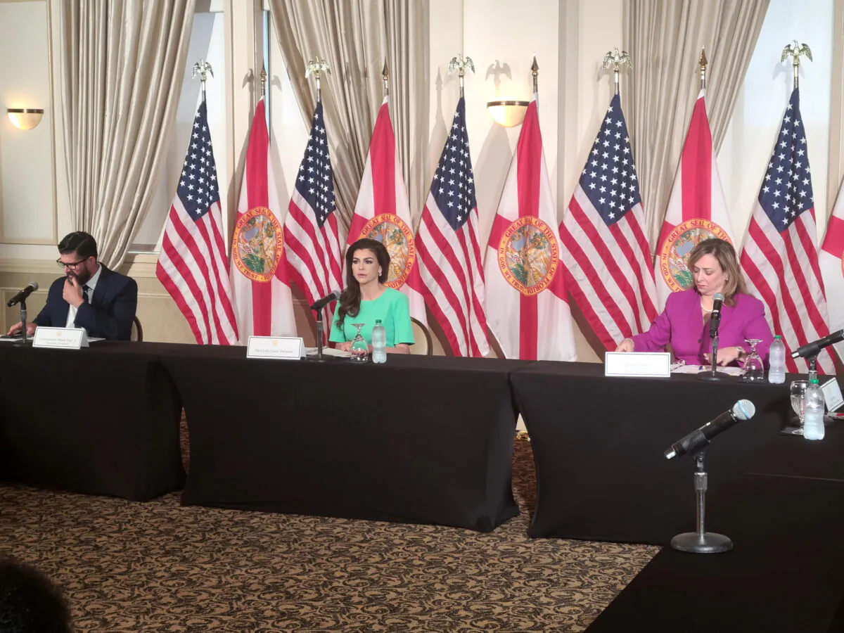 Florida First Lady Casey DeSantis leads a roundtable on March 22 at Florida State University to announce the state's new resiliency  initiatives for schoolchildren. From left, State Education Commissioner Manny Diaz, DeSantis, and Miami-Dade County School Board Member Monica Colucci. (Dan M. Berger/The Epoch Times.)