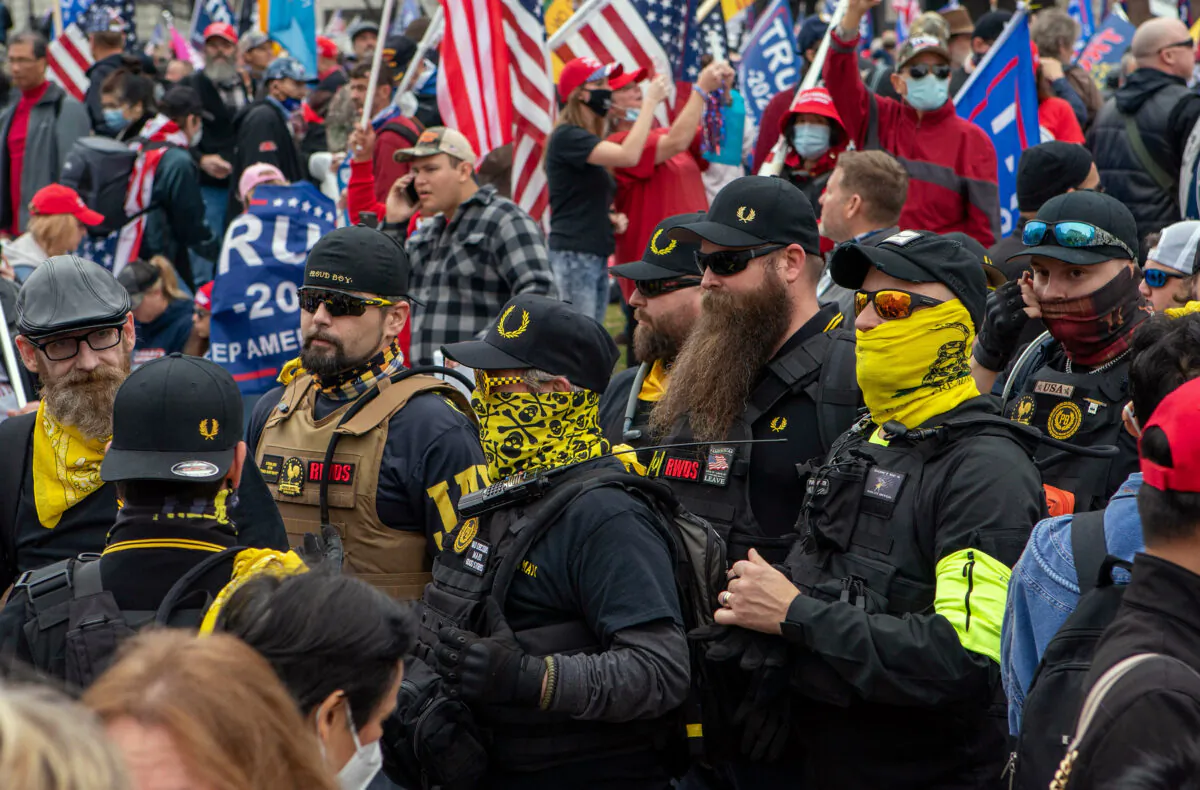 Members of the Proud Boys join supporters of U.S. President Donald Trump as they demonstrate in Washington D.C. on Dec. 12, 2020. (JOSE LUIS MAGANA/AFP via Getty Images)