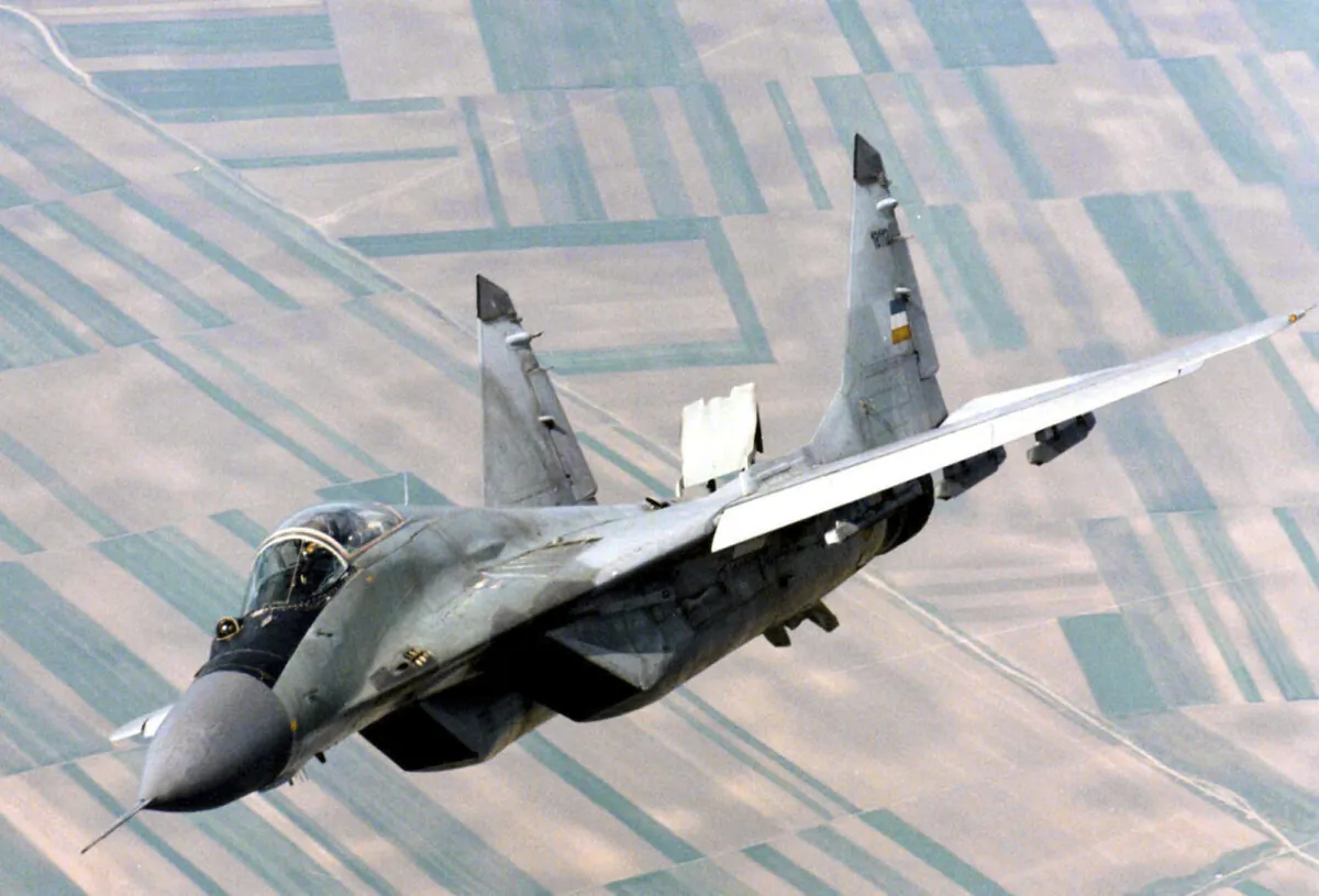 A Yugoslav airforce Mig-29 fighter flies over Belgrade on June 1998, during patrol duty. (Sasa Radic/AP Photo)