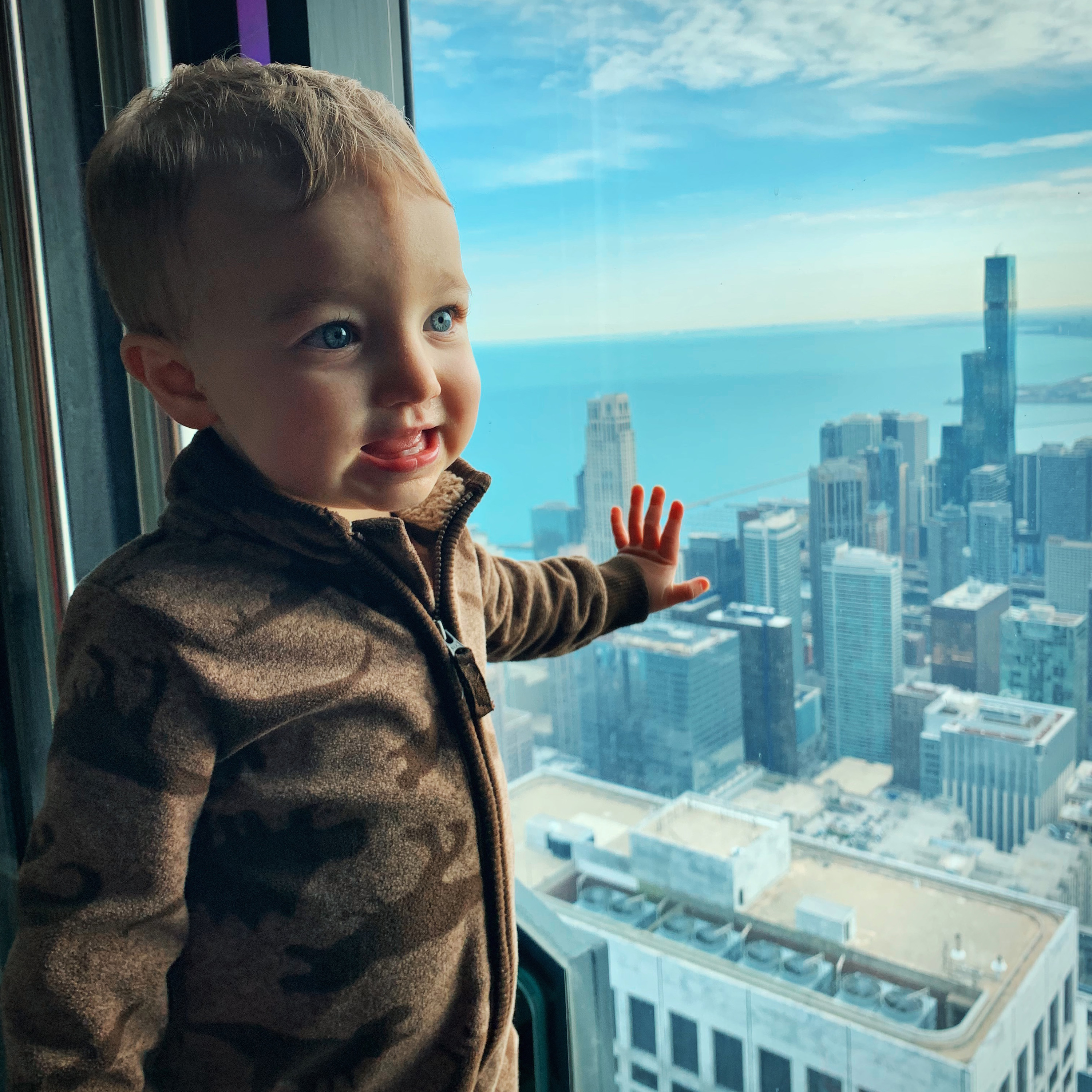 Max Smith, 2, sees the skyline of Chicago as he travels the world.