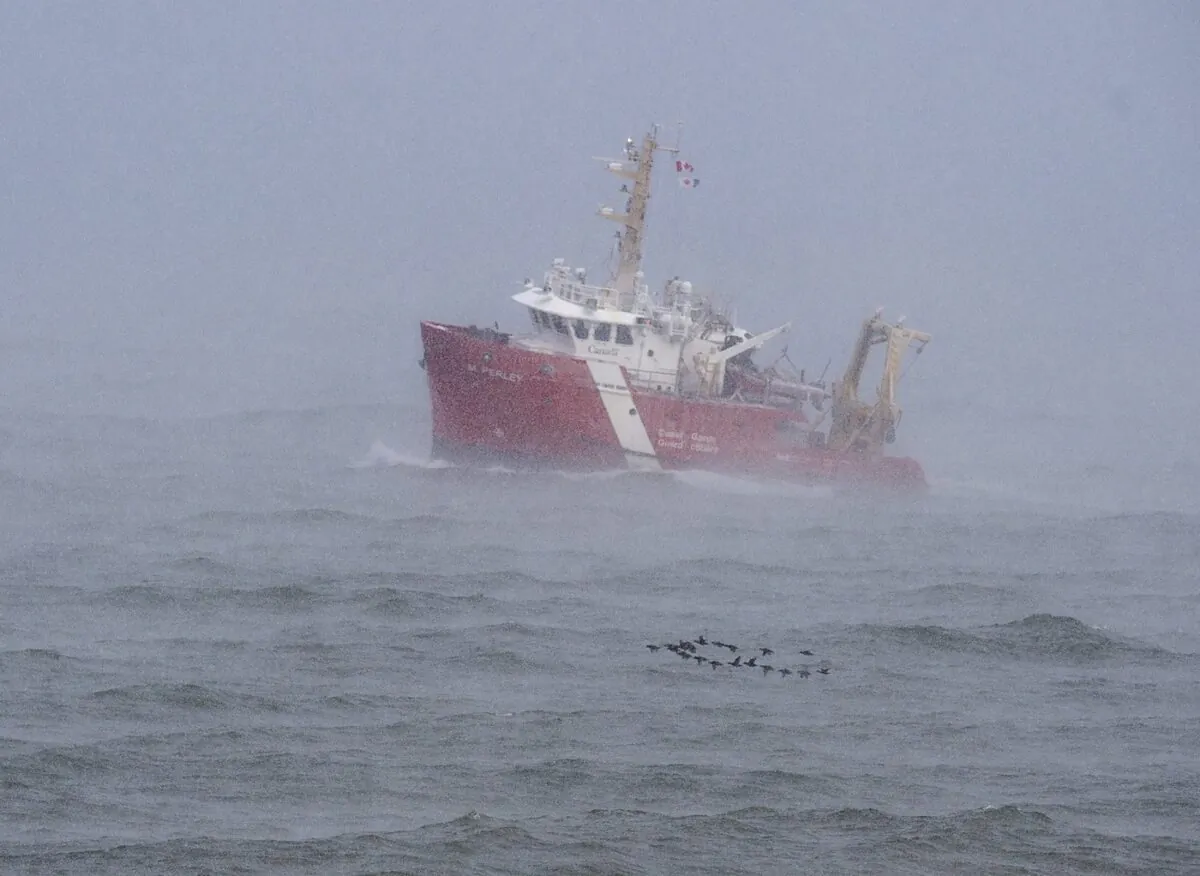 The CGGS M. Perley searches the waters of the Bay of Fundy in Hillsburn, N.S. on Dec. 16, 2020 as they continue to look for five fishermen missing after the scallop dragger Chief William Saulis sank in the Bay of Fundy. (The Canadian Press/Andrew Vaughan)