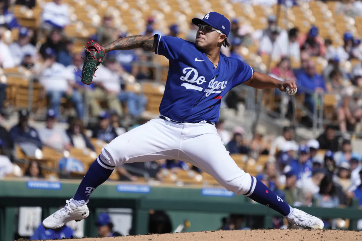 Los Angeles Dodgers starting pitcher Julio Urias throws a pitch against the Cincinnati Reds during the second inning of a spring training baseball game in Phoenix on Feb. 28, 2023. (Ross D. Franklin/AP Photo)