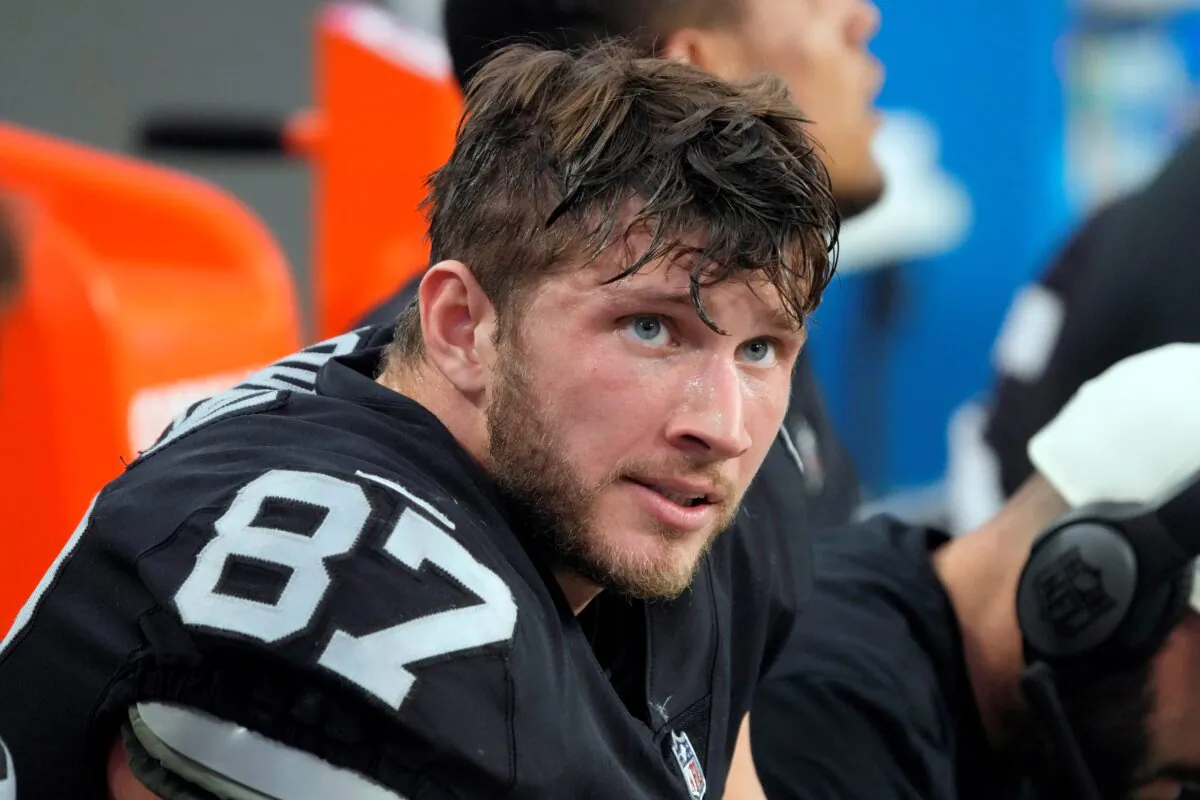Las Vegas Raiders tight end Foster Moreau (87) watches from the sideline during the first half of an NFL football game against the Kansas City Chiefs, in Las Vegas on Jan. 7, 2023. (Rick Scuteri/AP Photo)