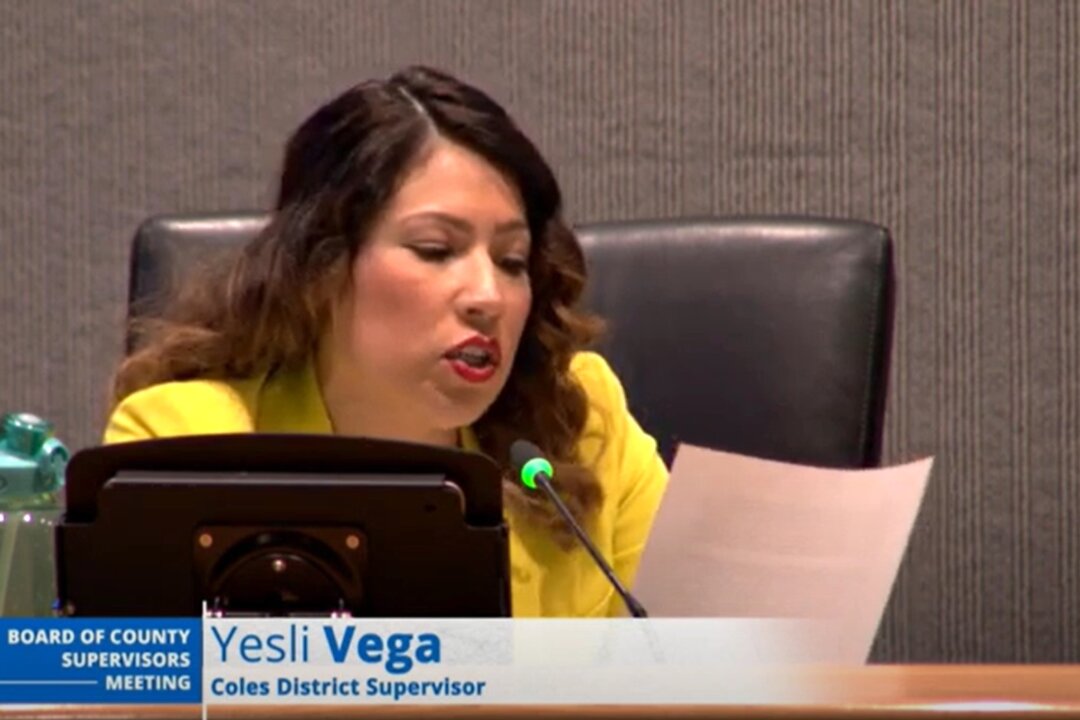 Coles District Supervisor Yesli Vega reads an email from an anonymous county employee regarding a survey sent to all county employees by Prince William County's Diversity, Equity and Inclusion (DEI) Office on March 14, 2023. (Screenshot/Board of County Supervisors Meeting)