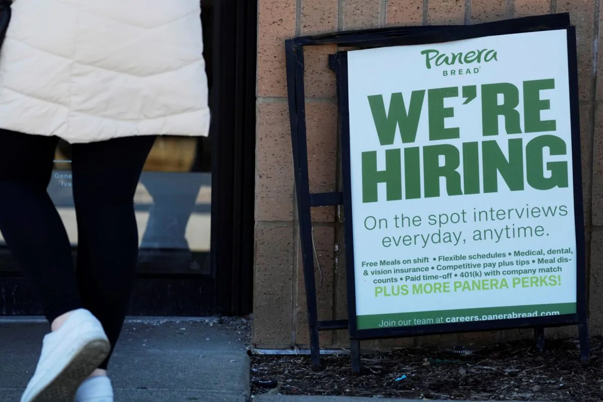 A hiring sign is displayed at a restaurant in Mount Prospect, Ill., on March 19, 2023. (Nam Y. Huh/AP Photo)