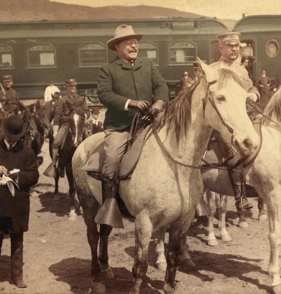 U.S. president Theodore Roosevelt, circa 1903, as he and others prepare to enter Yellowstone, Wyoming. (Everett Collection/Shutterstock)