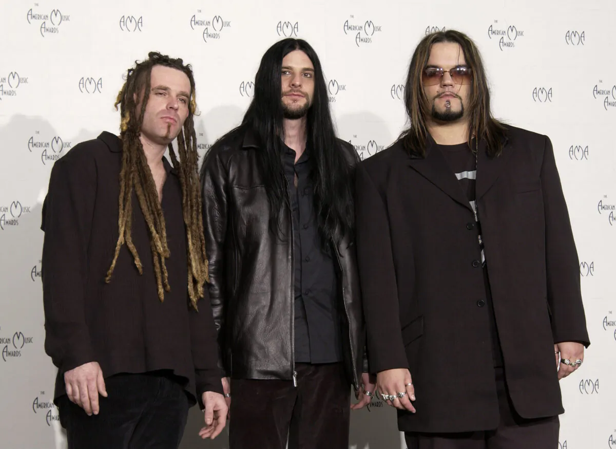 The band Saliva poses backstage during the 30th Annual American Music Awards (AMA) at the Shrine Auditorium in Los Angeles, Calif., on Jan 13, 2003. (Robert Mora/Getty Images)