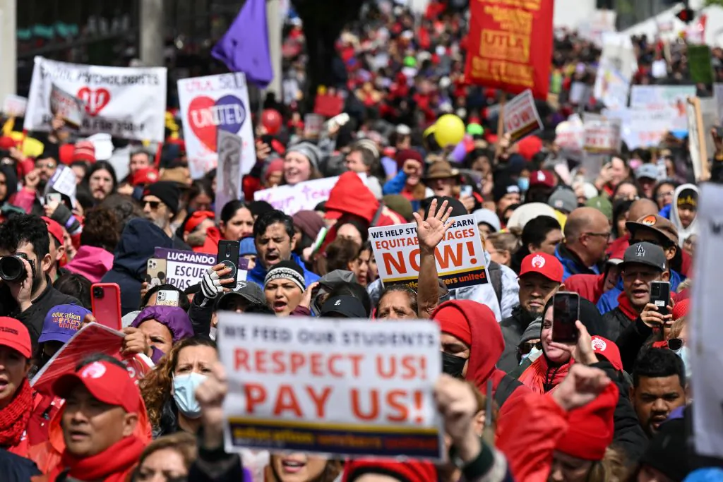 Los Angeles public school support staff, teachers, and supporters rally outside of the school district headquarters on the first day of a three day strike in Los Angeles on March 21, 2023. (Robyn Beck/AFP via Getty Images)