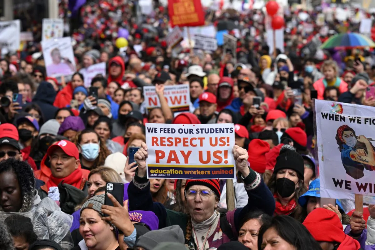 Los Angeles public school staff, teachers, and supporters rally outside of the school district headquarters on the first day of a three day strike in Los Angeles on March 21, 2023. (Robyn Beck/AFP via Getty Images)