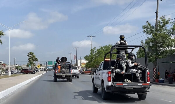 National Guard and military vehicles take part in an operation to transfer two of the four U.S. citizens kidnapped in Mexico back to Brownsville, Texas, after the other two were found dead, in Matamoros, Mexico, on March 7, 2023.