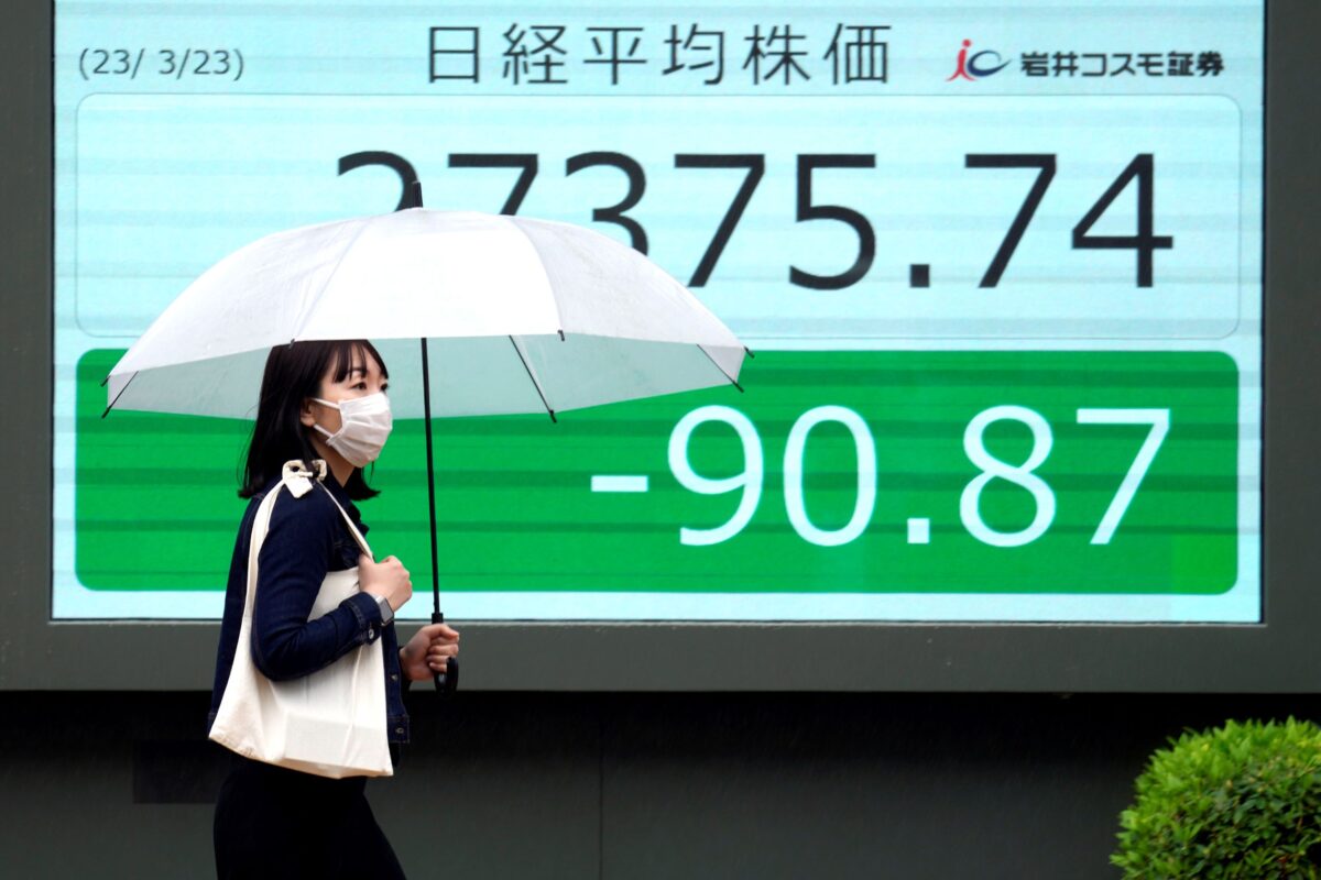 NextImg:Global Shares Mixed After Fed Hints Rate Hikes May End Soon