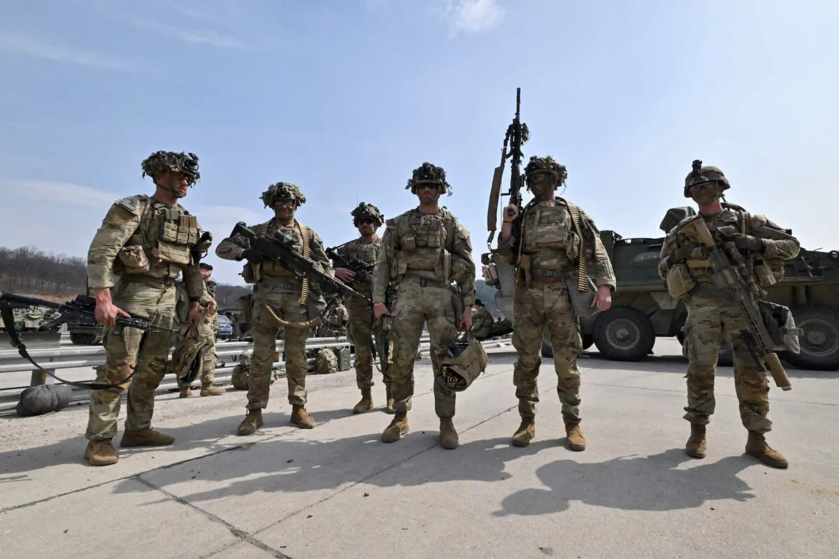 U.S. soldiers from the 2nd Infantry Division Stryker Battalion prepare for a Warrior Shield live fire exercise at a military training field in Pocheon, South Korea, on March 22, 2023. (Jung Yeon-je/AFP via Getty Images)