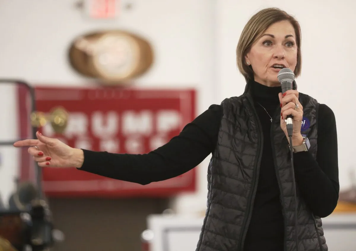 Iowa Gov. Kim Reynolds speaks at a campaign event for Sen. Joni Ernst (R-Iowa) at Dahl Auto Museum as part of Ernst's RV tour of Iowa, in Davenport, on Oct. 31, 2020. (Mario Tama/Getty Images)