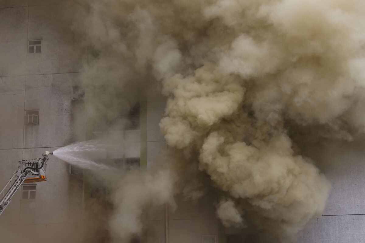 NextImg:Thousands Evacuated as Fire Hits Warehouse in Crowded Hong Kong District
