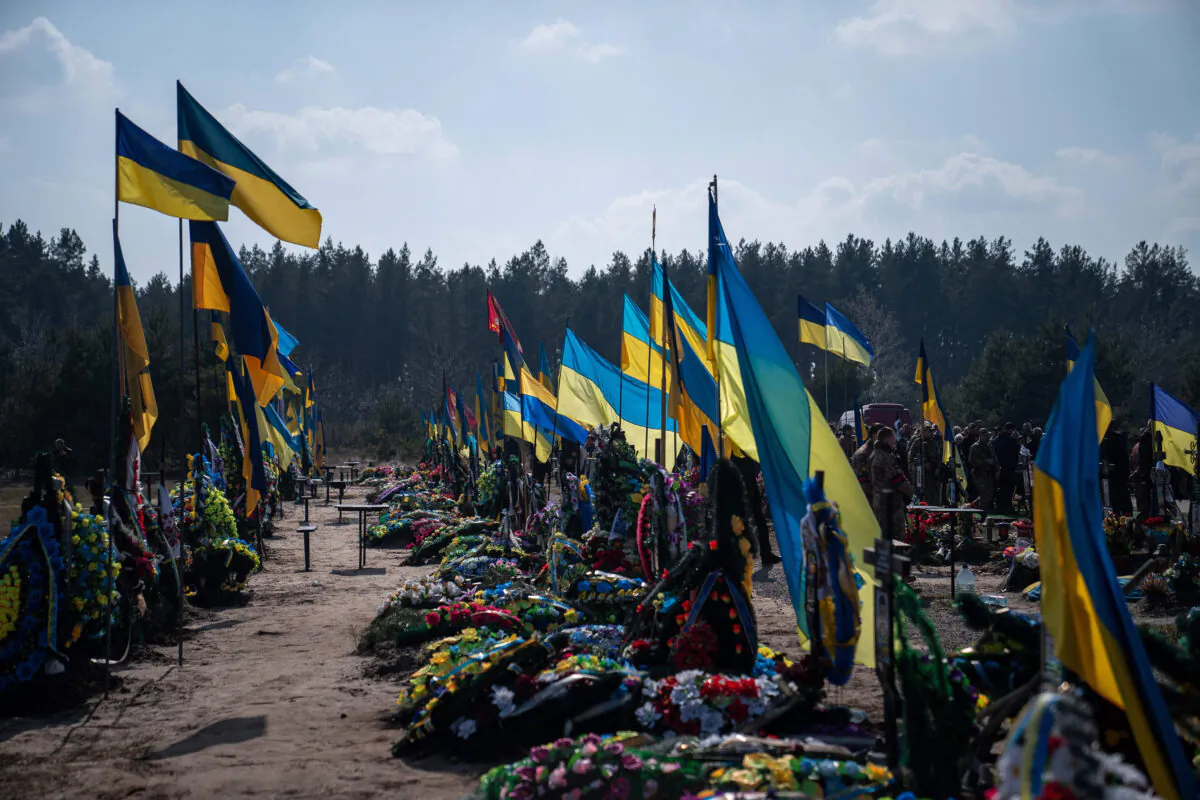 Flags are displayed at a funeral ceremony in Poltava, amid Russia’s military invasion on Ukraine, on March 22, 2023. (Ihor Tkachov/AFP/Getty Images)