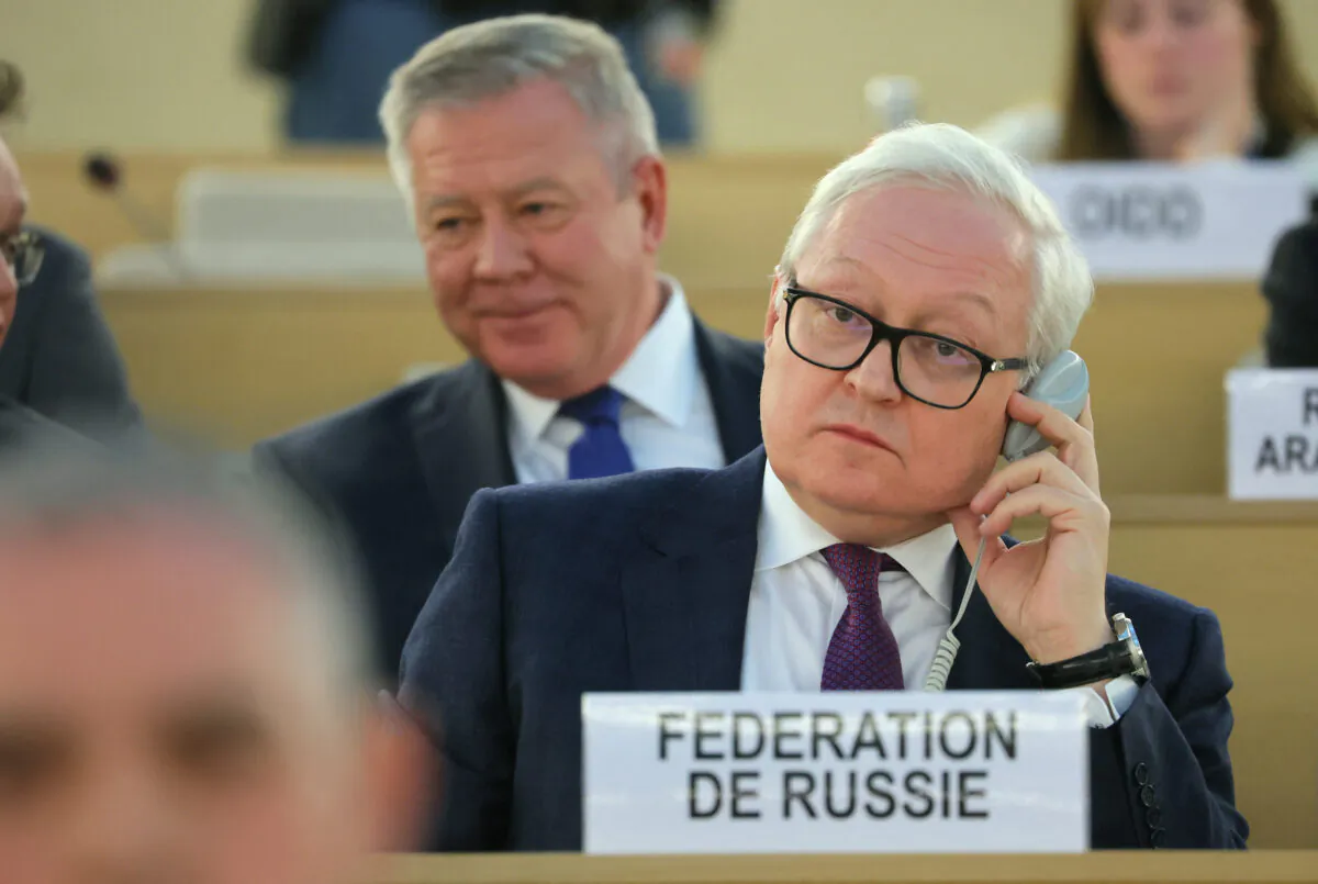 Russian Ambassador to the U.N. Gennady Gatilov (L) and Russian Deputy Foreign Minister Sergei Ryabkov (R) attend the Human Rights Council at the United Nations in Geneva, on March 2, 2023. (Denis Balibouse/Reuters)