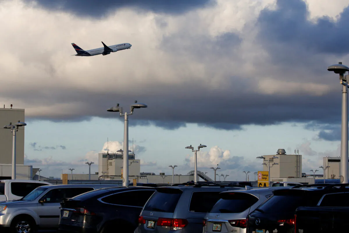 A Latam Airlines plane takes off from Miami International Airport in Florida on Jan. 2, 2023. (Marco Bello/Reuters)