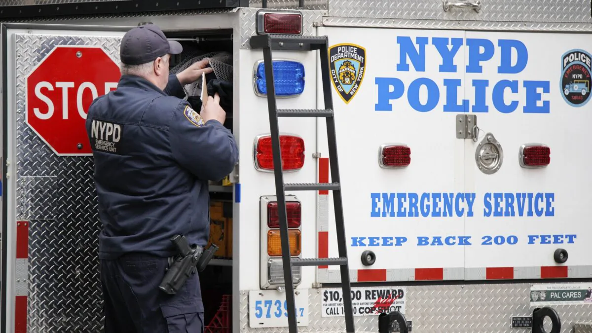 New York Police Department officers of the emergency service unit arrive at the courthouse after powder in an envelope meant for the district attorney's office was found, in New York on March 24, 2023. (AP Photo/Eduardo Munoz Alvarez)