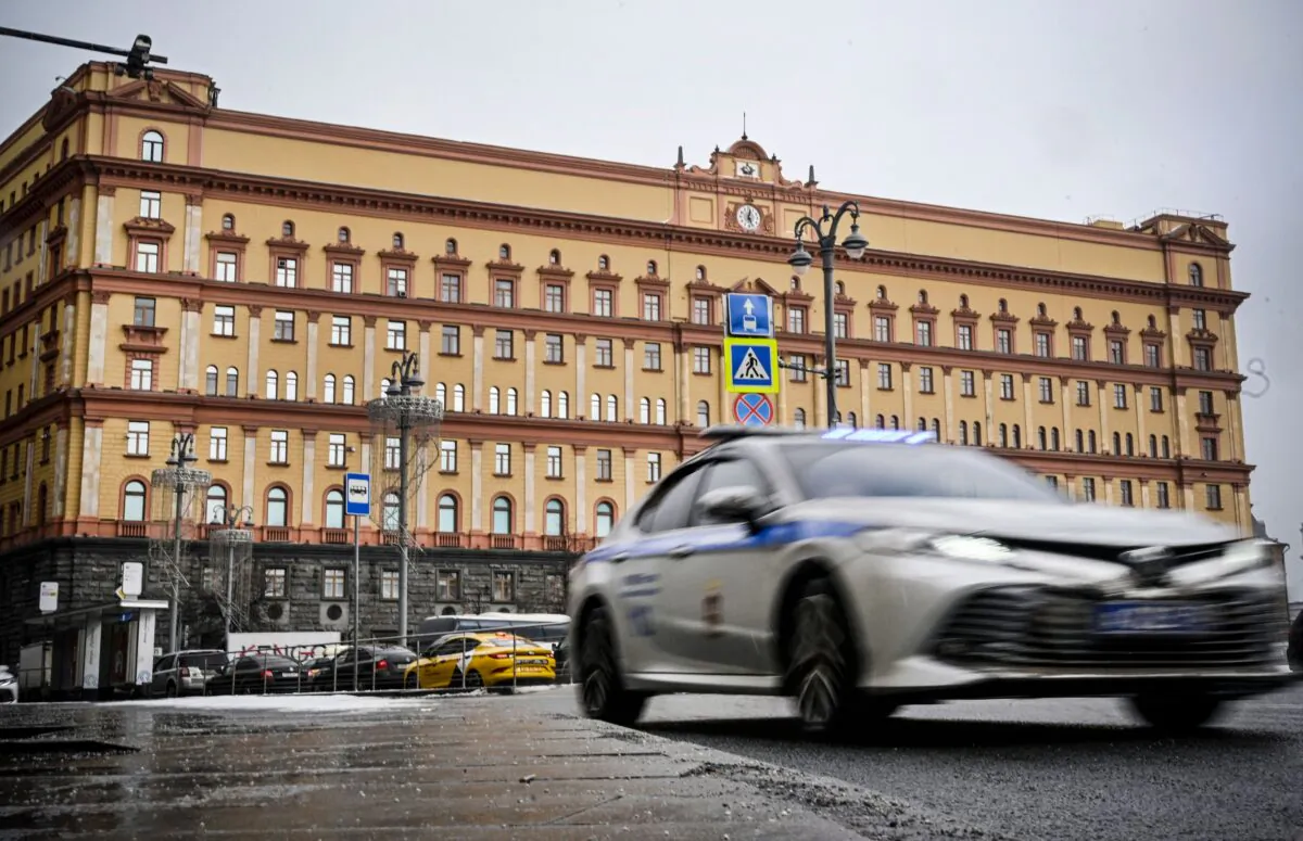A police car goes past the headquarters of the Federal Security Service, the successor agency to the KGB, in central Moscow on March 3, 2023. (Alexander Nemenov/AFP via Getty Images)