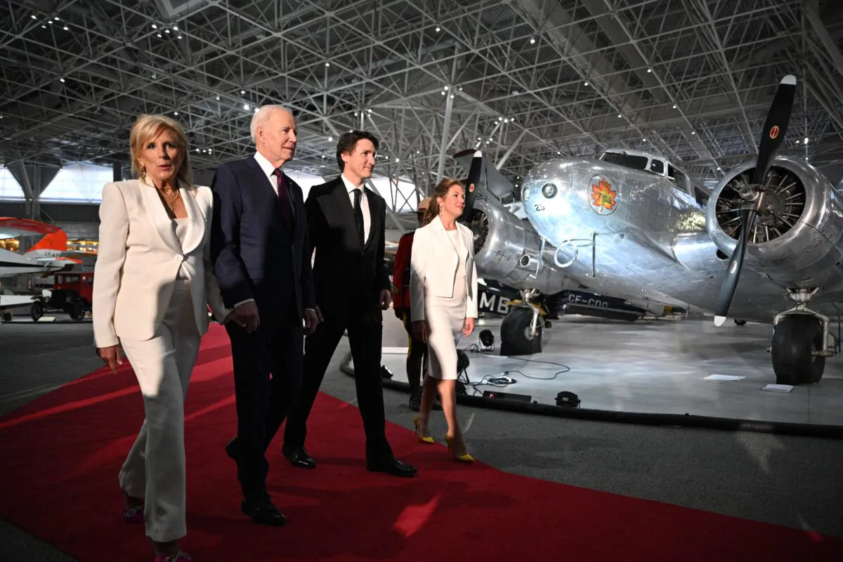 US President Joe Biden, First Lady Jill Biden, Canadian Prime Minister Justin Trudeau, and his wife Sophie Gregoire Trudeau arrive to attend a gala dinner at the Canadian Aviation and Space Museum in Ottawa, Canada, on March 24, 2023. (Mandel Ngan/AFP via Getty Images)
