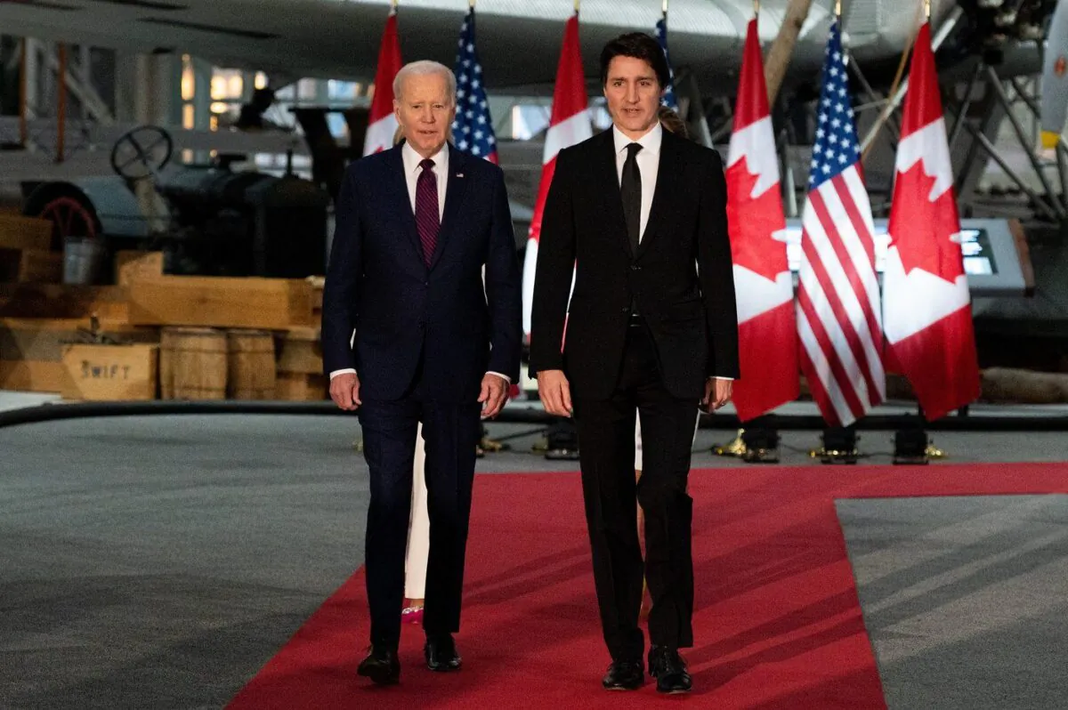 U.S. President Joe Biden, left, and Prime Minister Justin Trudeau arrive for an official dinner in Ottawa on Mar. 24, 2023. (The Canadian Press/Spencer Colby)
