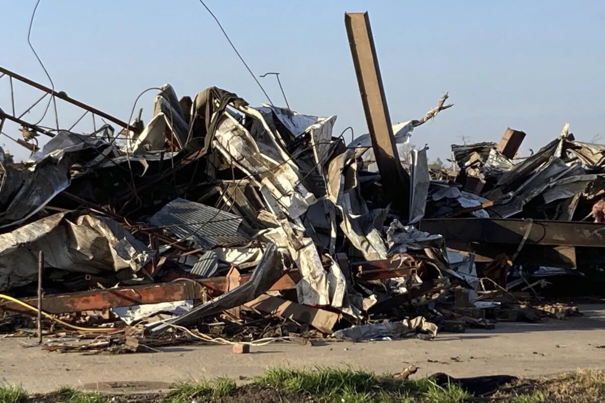 Debris covers a damaged structure in Rolling Fork, Miss,. on March 25, 2023.  (Rogelio Solis/AP Photo)