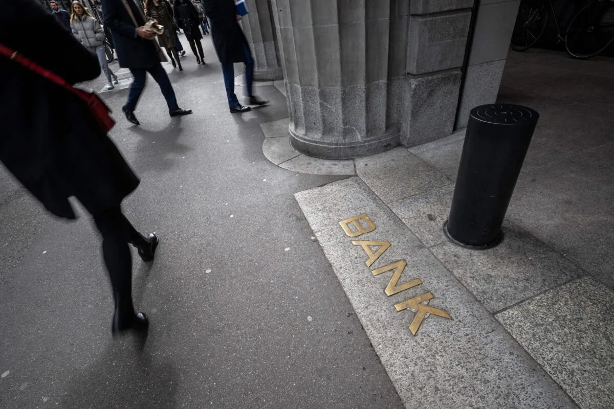 The sign "Bank" at the entrance of the headquarters of Swiss giant banking UBS in Zurich on March 20, 2023. (Fabrice Coffrini/AFP via Getty Images)