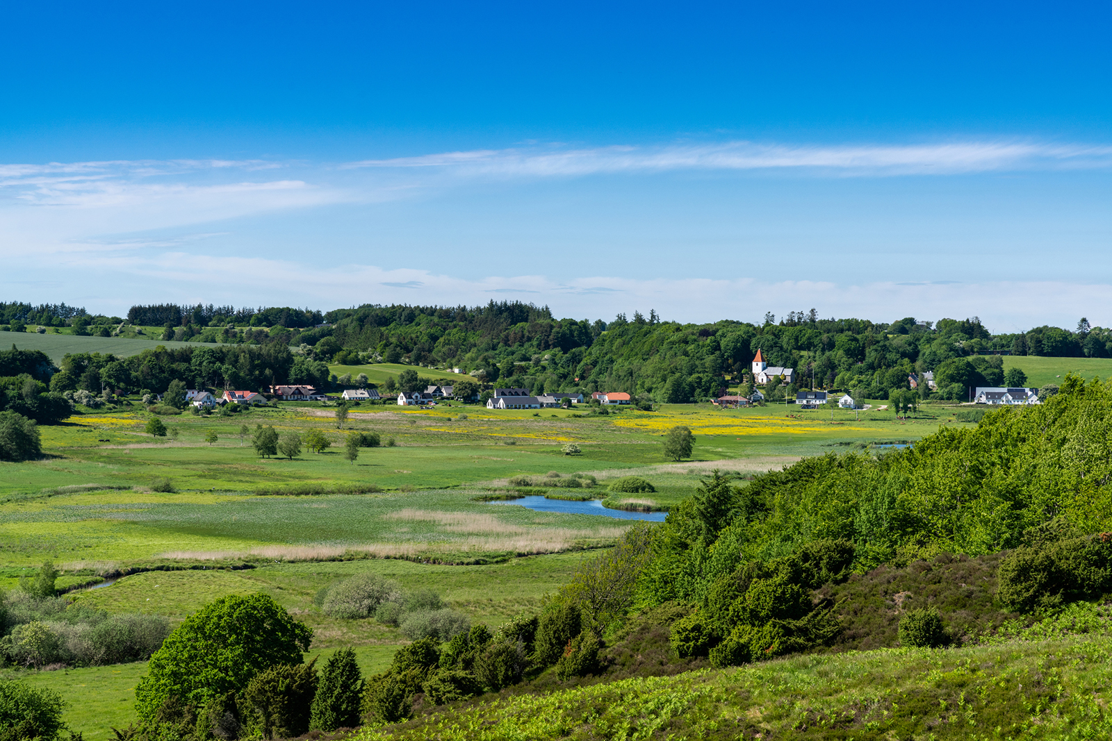 A Gravlev village and river landscape in northern Denmark.