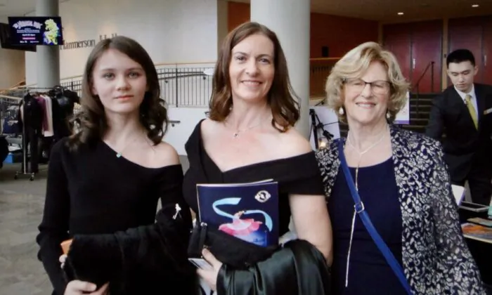 Susan Goebel (C) and her family attended Shen Yun's afternoon performance at the Living Arts Centre on March 25, 2023. (Teng Dongyu/The Epoch 