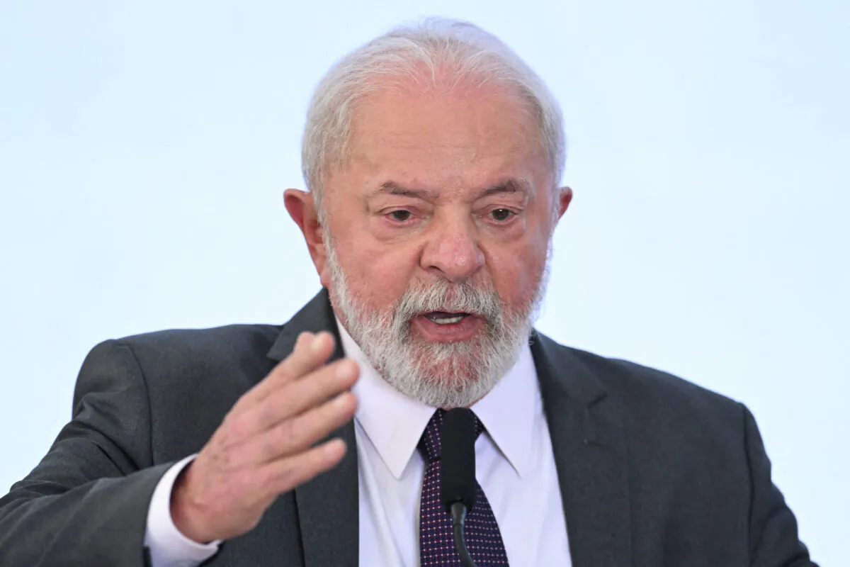 Brazilian President Luiz Inacio Lula da Silva gestures as he delivers a speech during the launch of the "Mais Médicos" program, at the Planalto Palace in Brasilia, Brazil, on March 20, 2023. (Evaristo Sa/AFP via Getty Images)