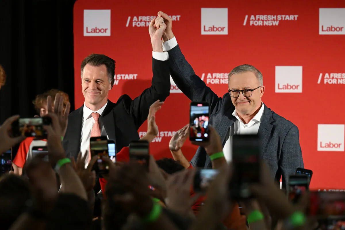 Australian Prime Minister Anthony Albanese introduces Labor leader and Premier elect Chris Minns at the NSW Labor reception in Sydney, Australia, on March 25, 2023. (AAP Image/Dean Lewins)
