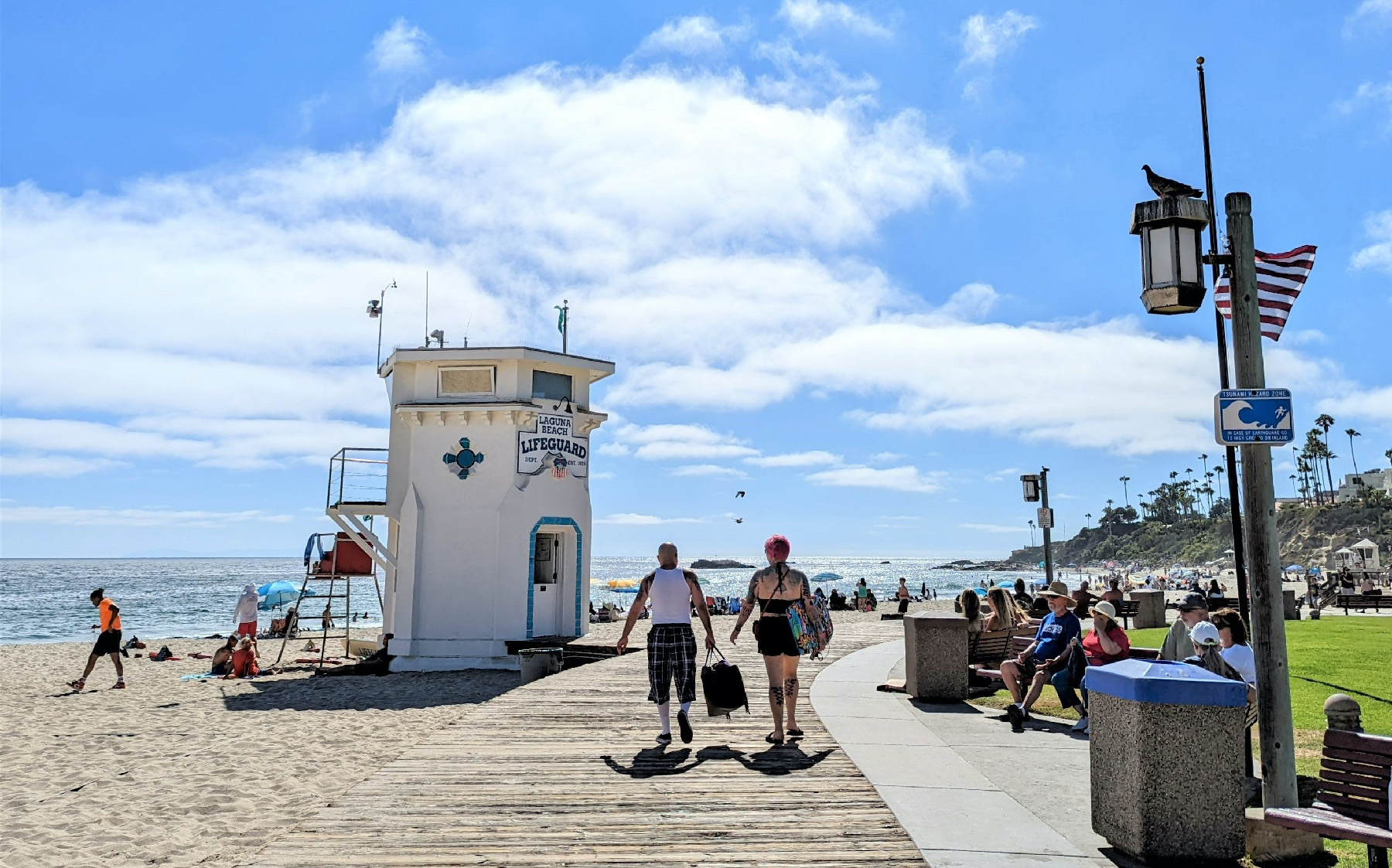A popular spot in Laguna Beach, California, is the boardwalk and historic lifeguard stand at Main Beach.