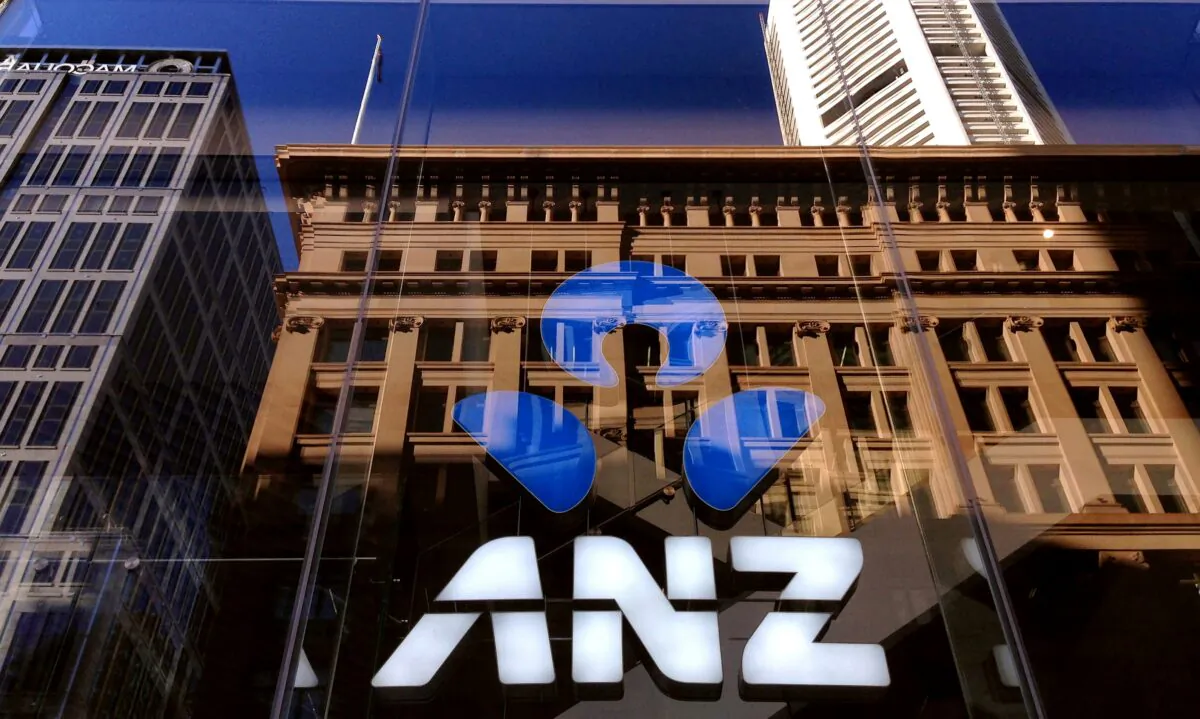 The logo of the ANZ Banking Group in the window of a branch in central Sydney, on Aprl 30, 2016. (David Gray/Reuters)