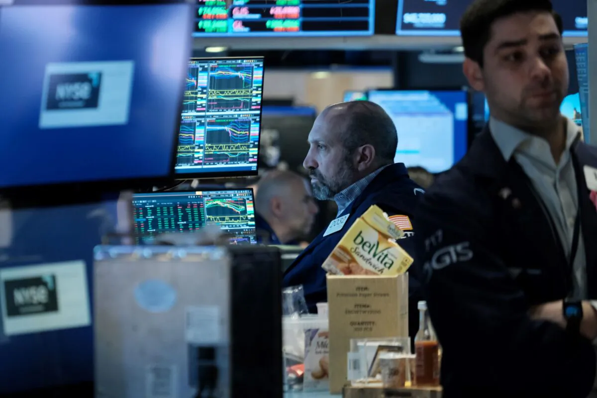 Traders work on the floor of the New York Stock Exchange (NYSE) in New York City on March 23, 2023. (Spencer Platt/Getty Images)
