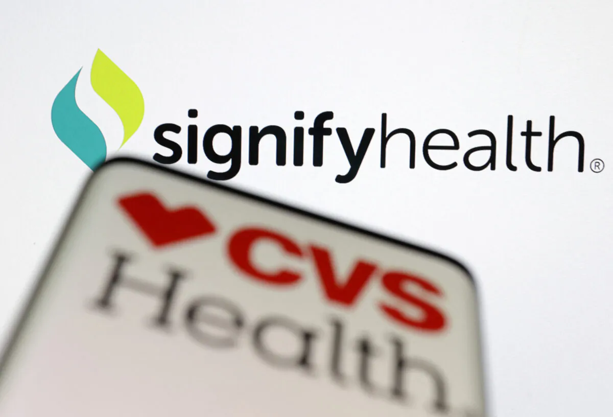 CVS Health and Signifyhealth logos in an illustration taken on Sept. 5, 2022. (Dado Ruvic/Illustration/Reuters)