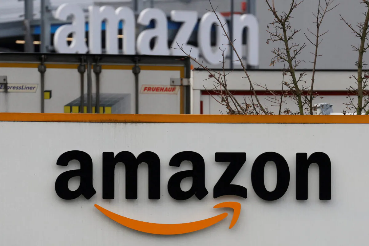 The logo of Amazon at the company logistics center in Lauwin-Planque, northern France, on Jan. 5, 2023. (Pascal Rossignol/Reuters)