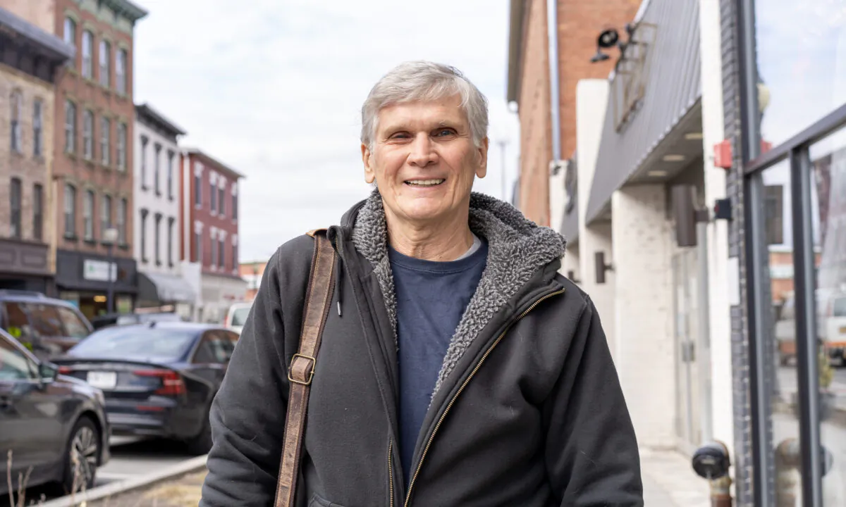 Mike Ward stands on Front Street in downtown Port Jervis, N.Y., on March 27, 2023. (Cara Ding/The Epoch Times)