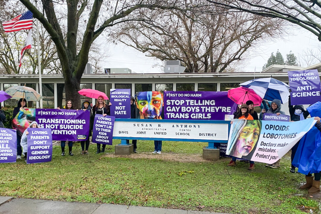 Parents protest outside the Davis Joint Unified School District offices over a talk featuring Rachel Pepper, co-author of “The Transgender Child,” in Davis, Calif., on Jan. 11, 2023. (Courtesy of Our Duty)
