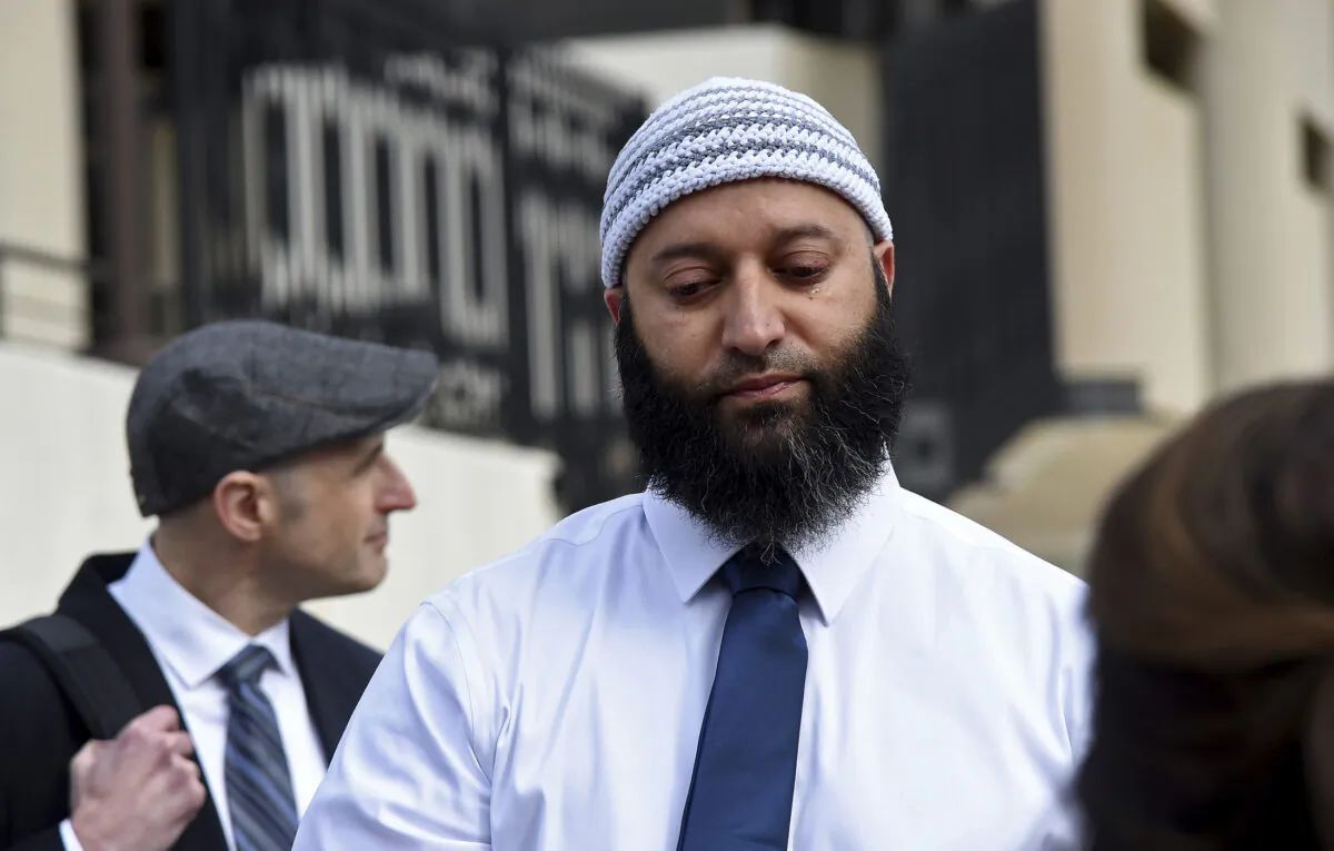 Adnan Syed gets emotional as he speaks to reporters outside the Robert C. Murphy Courts of Appeal building after a hearing in Annapolis, Md., on Feb. 2, 2023. (Barbara Haddock Taylor/The Baltimore Sun via AP)